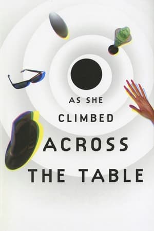 As She Climbed Across the Table