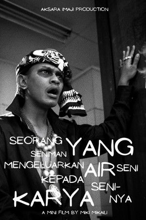 Seorang Seniman yang Mengeluarkan Air Seni Kepada Karya Seni-nya