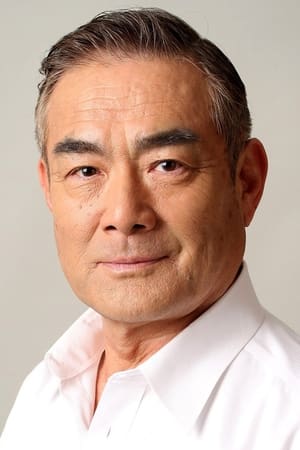 辻万长