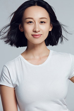 练束梅